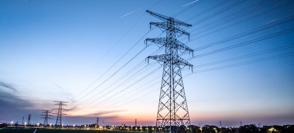 Landscape with high-voltage electricity pylons